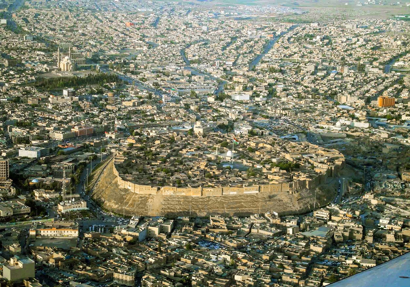 Aerial view of the Erbil Citadel rising above the city of Hewlêr, Kurdistan Region of Iraq